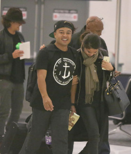Exclusive... Orlando Bloom & Selena Gomez Depart From LAX At The Same Time